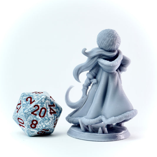 Gray figurine of a character with a long coat and hat next to a D20 dice on a white background