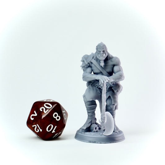 Gray figurine of a warrior with a weapon next to a brown polyhedral dice on a white background