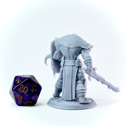 Gray fantasy figurine with a purple and gold die on a white background
