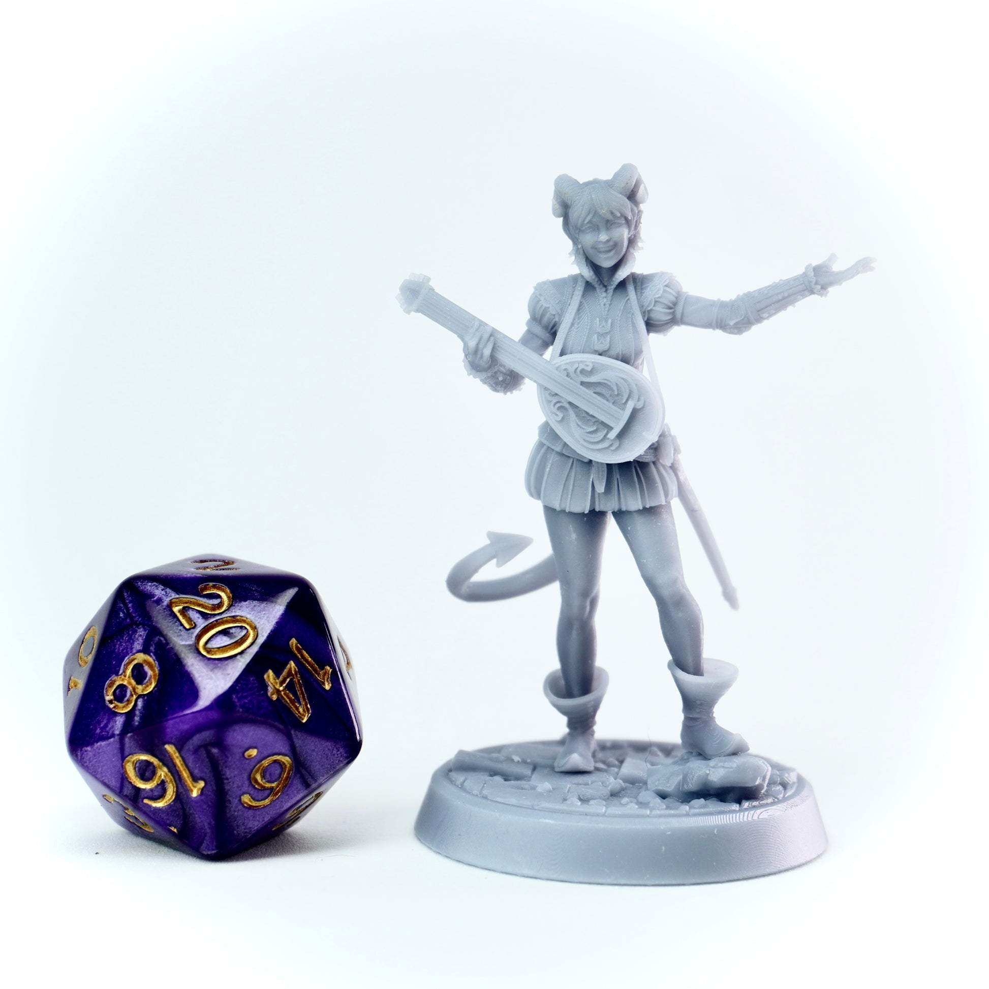 Unpainted bard tiefling miniature figure of a fantasy character with a lute, next to a 20-sided die on a white background.