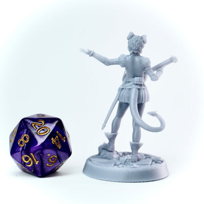 Gray figurine of a bard tiefling with a lute next to a polyhedral dice on a white background
