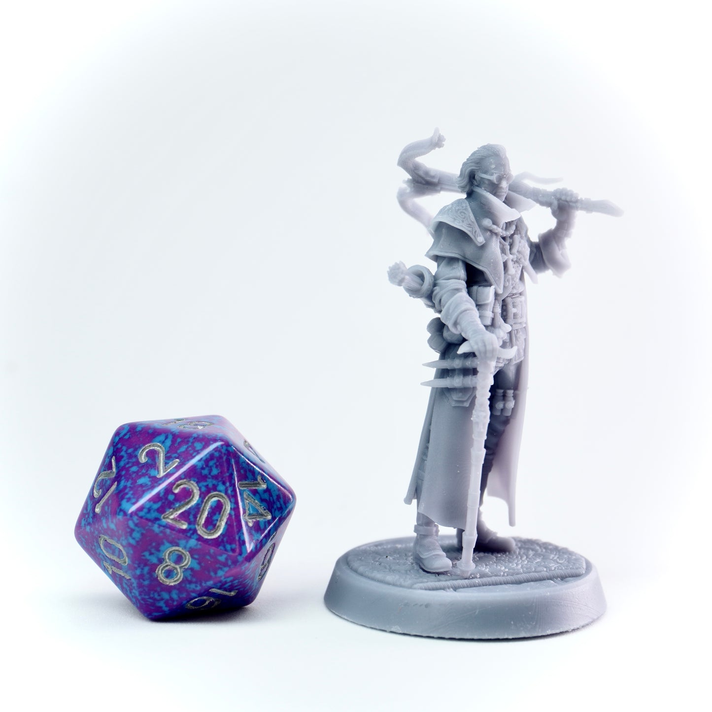 Gray fantasy figurine with a large polyhedral dice on a white background
