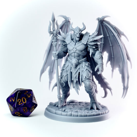 Fantasy demon figurine with wings and armor next to a polyhedral dice on a white background