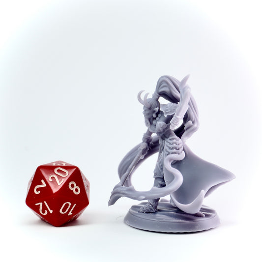 Gray fantasy figurine with a red eight-sided die on a white background