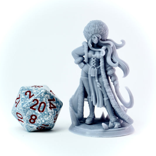 Gray female figurine with a weapon next to a D20 dice on a white background
