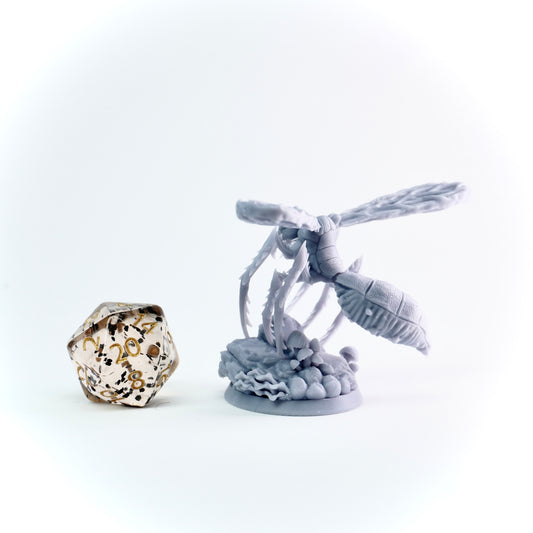 Decorative miniature with giant insect and on a white background