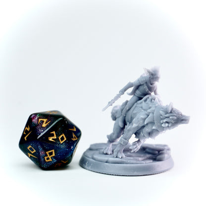 Gray fantasy figurine of a warrior on a wolf with a large polyhedral dice on a white background