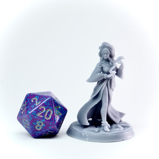 Gray figurine of a character with a purple polyhedral dice on a white background