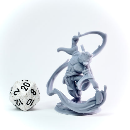 Gray fantasy figurine on a white background with a 20-sided die.