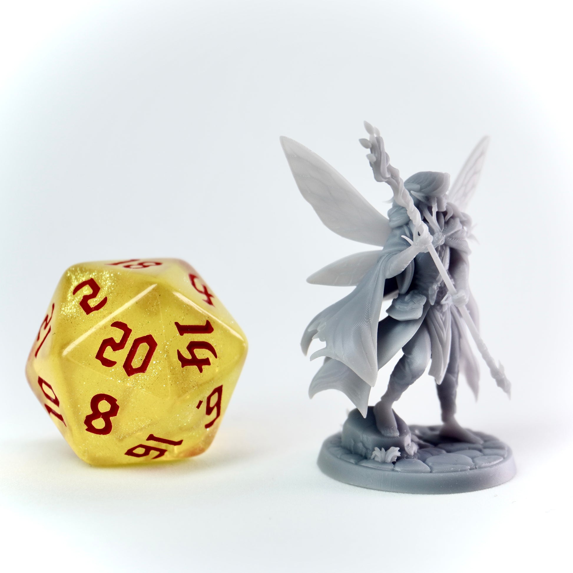 Pixie Mage miniature, androgynous fey with wings and magical staff. Tiny spellcaster for D&D adventures.