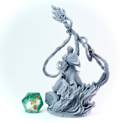 Gray figurine of a sea warrior on a white background with a green and gold die.