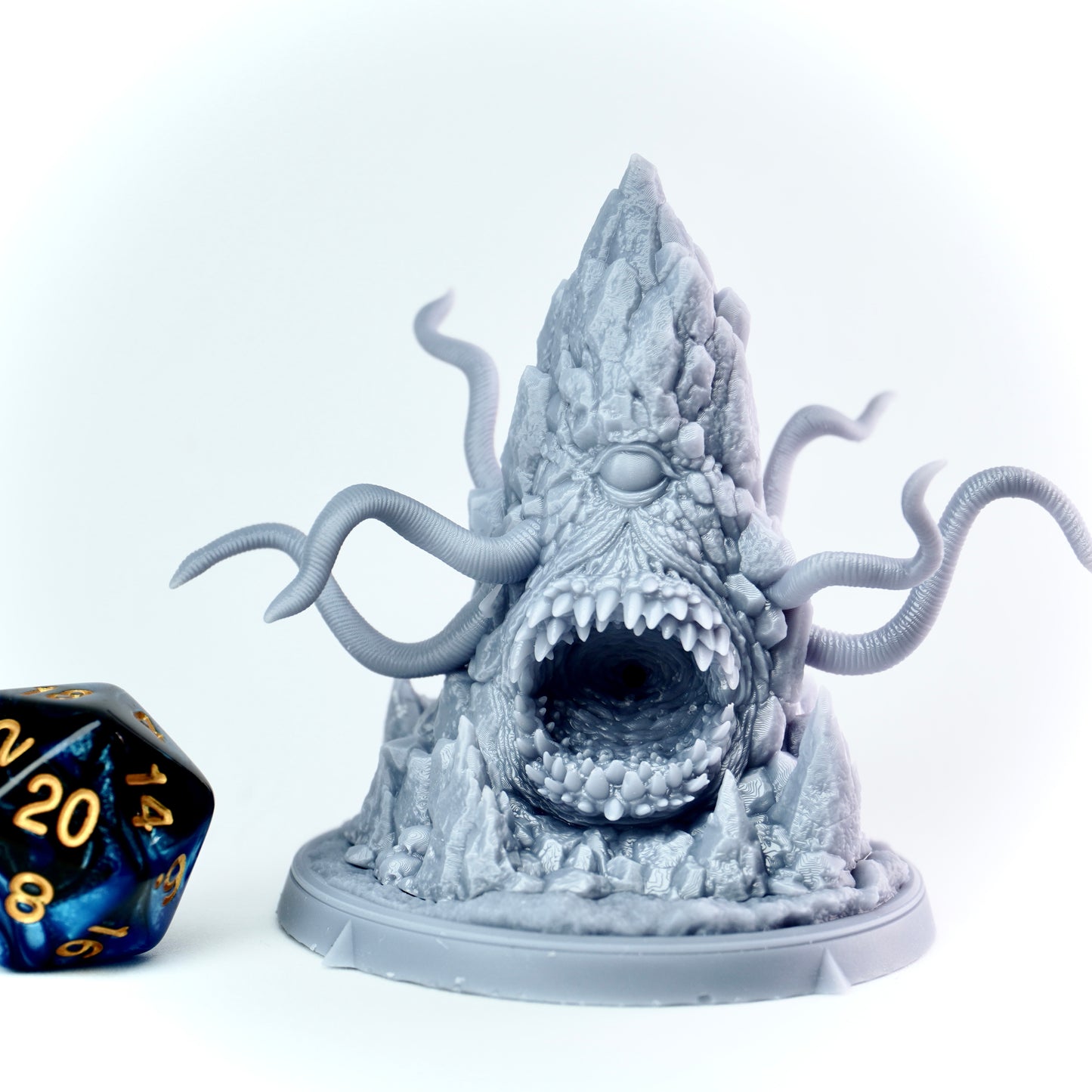 Cthulhu like roper figurine with tentacles on a white background