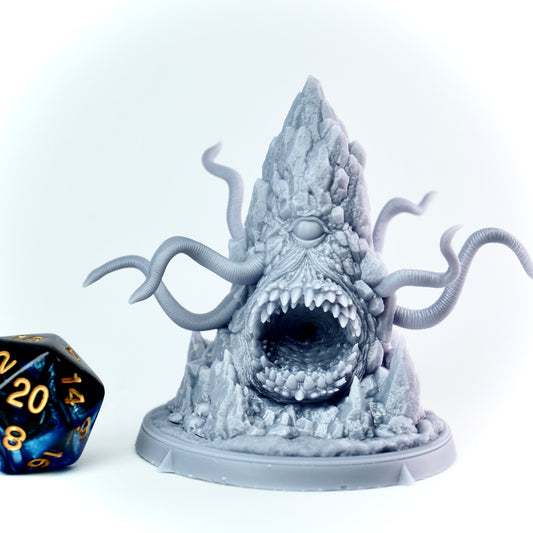Cthulhu like roper figurine with tentacles on a white background