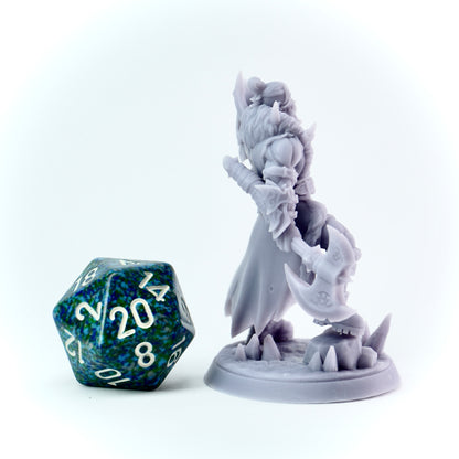 Gray fantasy warrior figurine with a large axe on a white background